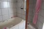 en suite bathroom with spa bath