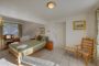 double bedroom with TV and bathroom en suite